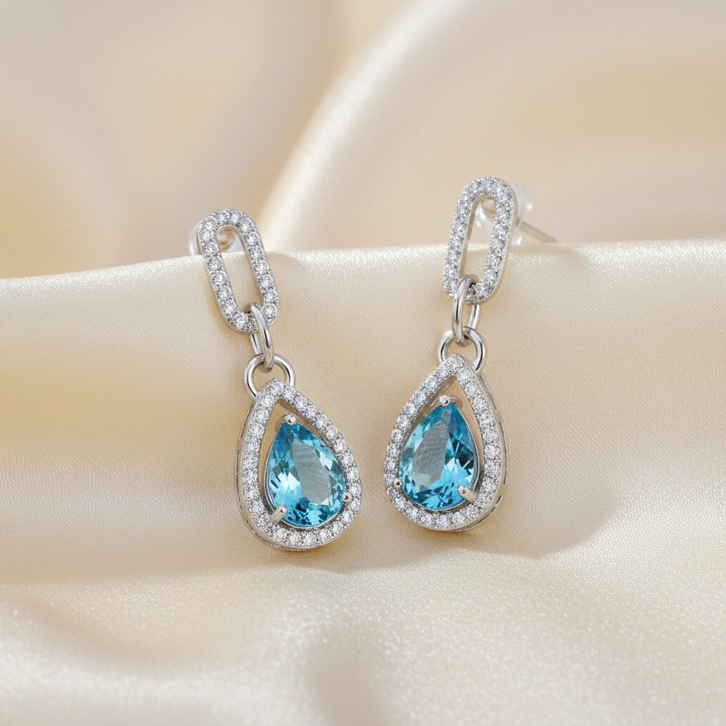 Sterling Silver Pear shaped Blue Topaz & White Topaz Paperclip Earrings