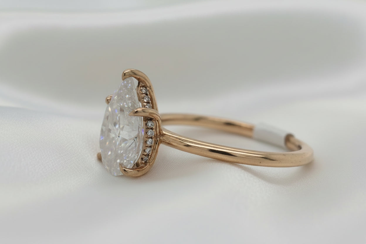 Estate Pear Moissanite Solitaire Ring with Hidden Halo