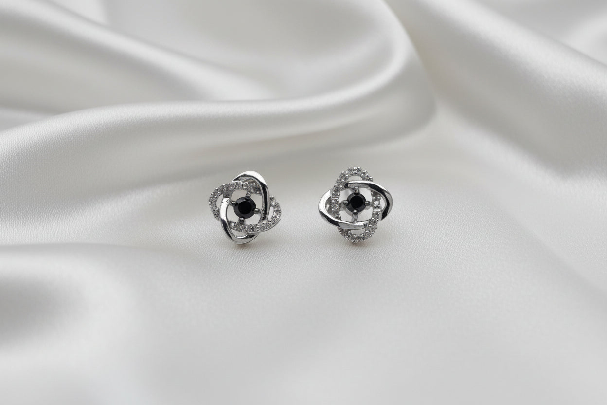 Estate Love Knot Black and White Diamond Earrings