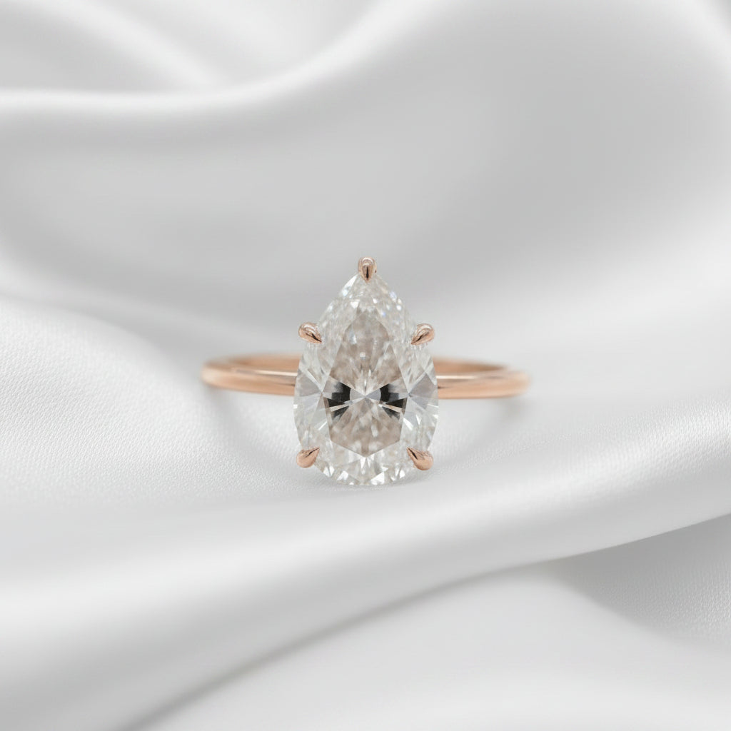 Estate Pear Moissanite Solitaire Ring with Hidden Halo